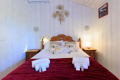 Un ou plusieurs lits dans un hébergement de l'établissement Maison des Bonheurs Océaniques - Welkeys