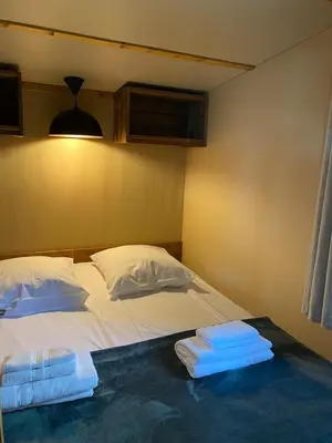 Un ou plusieurs lits dans un hébergement de l'établissement Chalet du Bassin Arcachon - Camping Parc aquatique