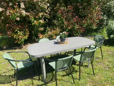 Jardin de l'établissement Charmante maison de famille avec jardin