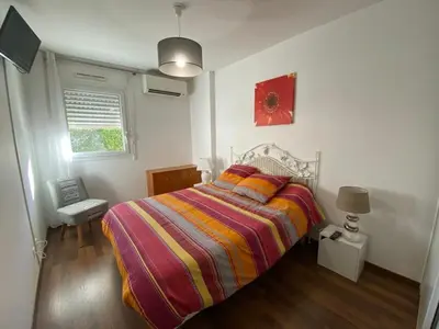 Un ou plusieurs lits dans un hébergement de l'établissement Superbe appartement très spacieux en centre ville
