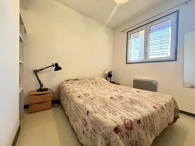 Un ou plusieurs lits dans un hébergement de l'établissement Bleu Courant - T4 avec balcon vue courant