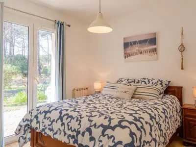 Un ou plusieurs lits dans un hébergement de l'établissement Holiday Home Bosquet des Ecureuils 17 by Interhome