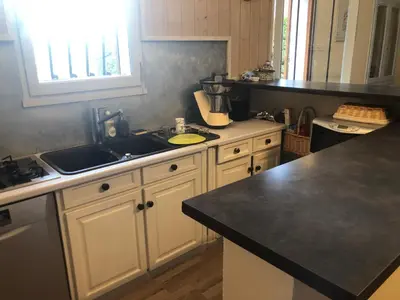 Cuisine ou kitchenette dans l'établissement Vieux-Boucau - Maison entière 8 pers