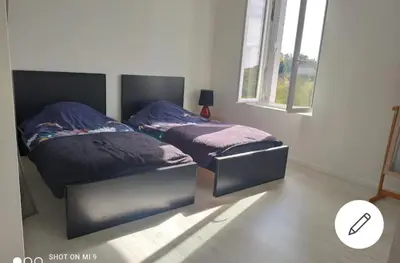 Un ou plusieurs lits dans un hébergement de l'établissement Maison cosy à la campagne, piscine et tranquillité