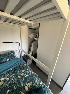 Un ou plusieurs lits dans un hébergement de l'établissement Chambre d'hôtes