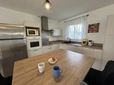 Cuisine ou kitchenette dans l'établissement Capcos
