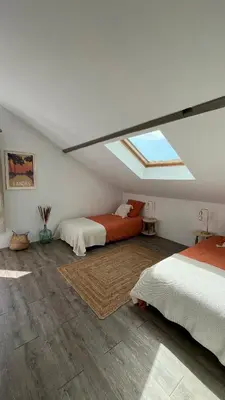 Un ou plusieurs lits dans un hébergement de l'établissement Sukha surf lodge