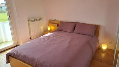 Un ou plusieurs lits dans un hébergement de l'établissement Casa Enolla