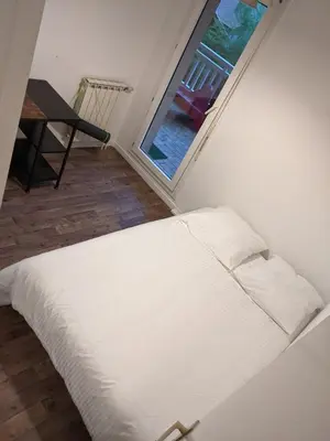 Un ou plusieurs lits dans un hébergement de l'établissement Capbreton 2 bedroom apartment between forest and beach