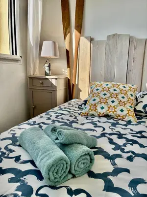 Un ou plusieurs lits dans un hébergement de l'établissement Ocean SPOT, Vue sur la mer, Vacance Famille, Parking, Surf, 4P