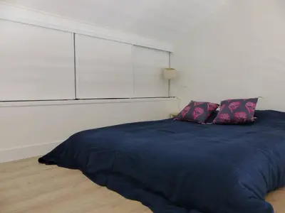 Un ou plusieurs lits dans un hébergement de l'établissement Villa pour 5 personnes proche du centre-ville d'Hossegor