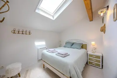 Un ou plusieurs lits dans un hébergement de l'établissement Maisonnette à Mont-de-Marsan