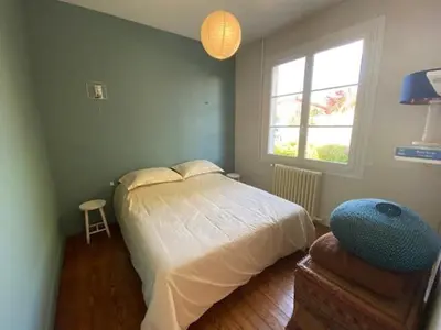 Un ou plusieurs lits dans un hébergement de l'établissement Maison au calme à Gujan Mestras
