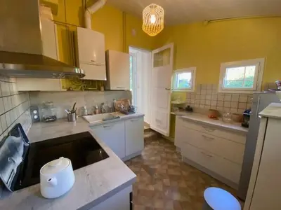Cuisine ou kitchenette dans l'établissement Maison au calme à Gujan Mestras