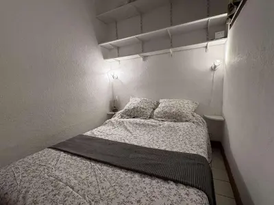 Un ou plusieurs lits dans un hébergement de l'établissement Appartement cosy avec terrasse pour 4 personnes à Biscarrosse Plage - FR-1-831-4