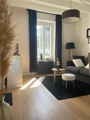 Coin salon dans l'établissement Appartement 4 étoiles dans propriété classée