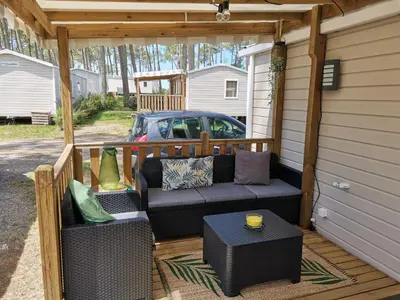 Coin salon dans l'établissement MOBIL HOME confort et charmant