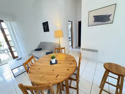 Coin salon dans l'établissement Maison de plain-pied avec Wi-Fi, proche mer - FR-1-831-10