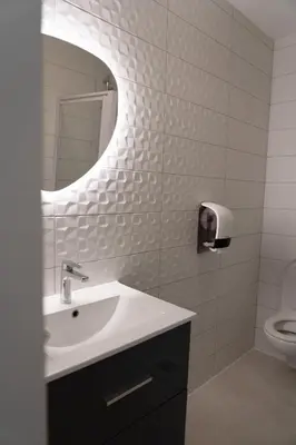 Salle de bains dans l'établissement Hotel Bleu Soleil