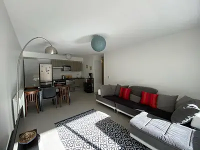 Un ou plusieurs lits dans un hébergement de l'établissement Appartement cosy proche centre Capbreton, situé dans un cadre boisé