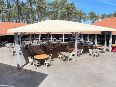 Restaurant ou autre lieu de restauration dans l'établissement Mobile Home 6 personnes