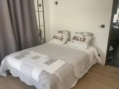 Un ou plusieurs lits dans un hébergement de l'établissement Villa de l'océan