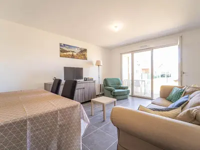 Coin salon dans l'établissement Appartement T3 neuf à Mimizan, 4 pers, proche centre, jardinet, parking inclus - FR-1-50-173