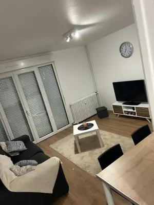 Télévision ou salle de divertissement dans l'établissement Appartement T2