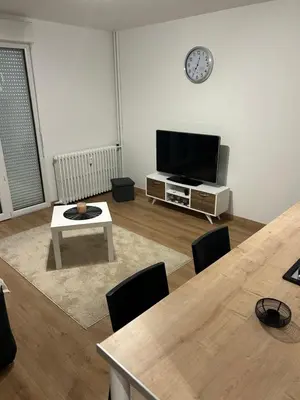 Télévision ou salle de divertissement dans l'établissement Appartement T2