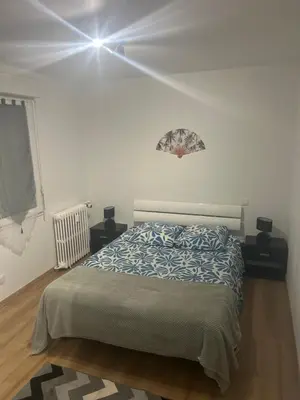Un ou plusieurs lits dans un hébergement de l'établissement Appartement T2
