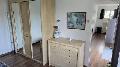 Télévision ou salle de divertissement dans l'établissement Maison de ville