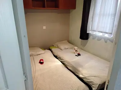 Un ou plusieurs lits dans un hébergement de l'établissement Mobile home camping Etche Zahar Urt