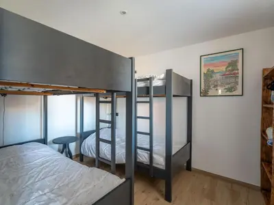 Un ou plusieurs lits dans un hébergement de l'établissement Appartement T3 PMR Biscarrosse 6 Pers, Clim Parking - FR-1-319-607