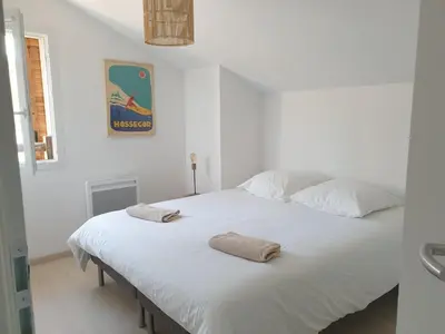 Un ou plusieurs lits dans un hébergement de l'établissement Villa de la plage 3 chambres, à 2 pas de l'océan