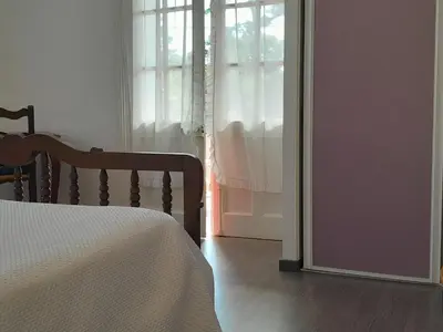Un ou plusieurs lits dans un hébergement de l'établissement Maison spacieuse à Capbreton, proche port et plages, jusqu'à 6 personnes - FR-1-239-1122