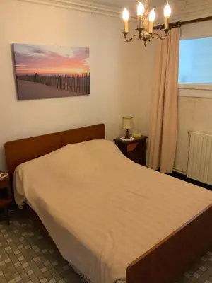 Un ou plusieurs lits dans un hébergement de l'établissement Appartement à Capbreton en bordure de forêt