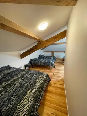 Un ou plusieurs lits dans un hébergement de l'établissement Charmante maison typique des Landes