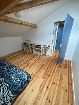 Un ou plusieurs lits dans un hébergement de l'établissement Charmante maison typique des Landes