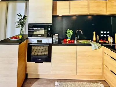 Cuisine ou kitchenette dans l'établissement Bungalow à quinze minutes des plages