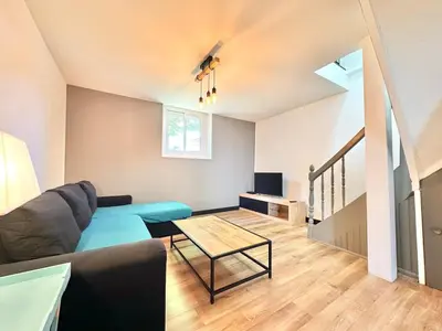 Coin salon dans l'établissement L'Orangerie Urbaine central