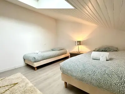 Un ou plusieurs lits dans un hébergement de l'établissement Duplex COSY - familial spacieux