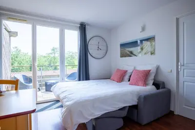 Un ou plusieurs lits dans un hébergement de l'établissement L'Esprit Landes - Ideal famille - piscine intérieur chauffée et extérieure