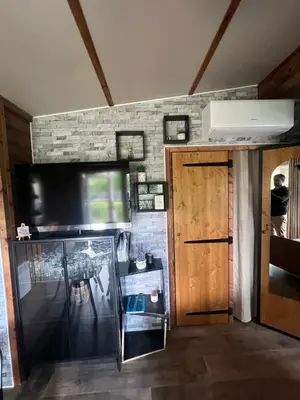 Cuisine ou kitchenette dans l'établissement Mobil home G11 tout confort