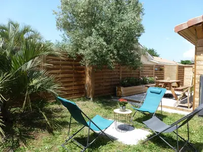 Jardin de l'établissement Maison style chalet au calme