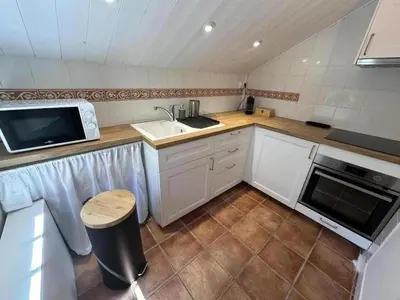 Cuisine ou kitchenette dans l'établissement Le gite de mia