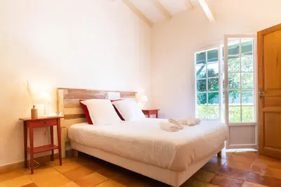 Un ou plusieurs lits dans un hébergement de l'établissement Villa des Landes - Seignosse - jacuzzi