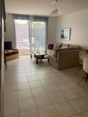 Télévision ou salle de divertissement dans l'établissement Charmante maison plage