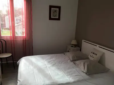 Un ou plusieurs lits dans un hébergement de l'établissement Hôtel La Cote d'Argent