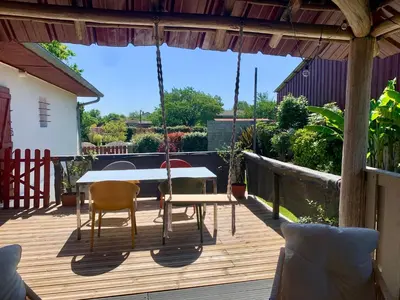Balcon ou terrasse dans l'établissement La villa Jeanne- Charmante maison avec très belle terrasse couverte à 10 min du centre de Salies de Bearn