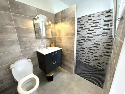 Salle de bains dans l'établissement Detente a deux